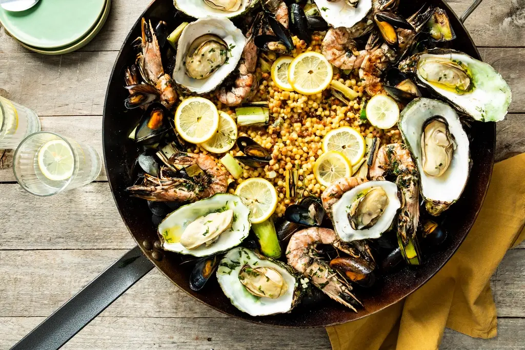 Mosselen, oesters en gamba's van de barbecue