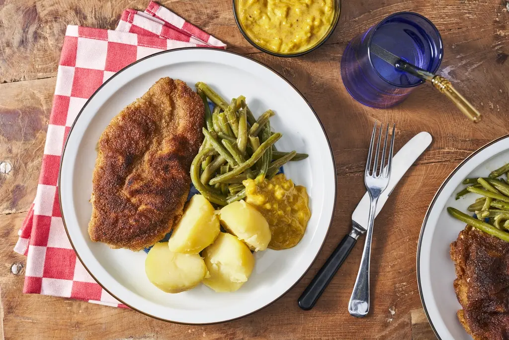 Gepaneerde kip met kerrie-ananas-saus
