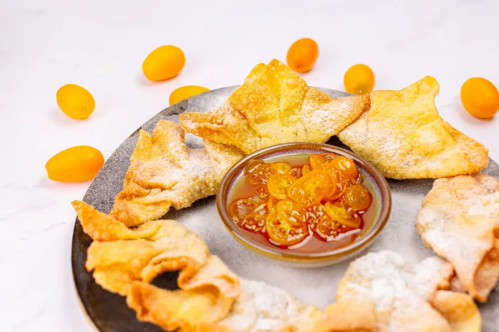 Zoete wonton met kumquatdressing